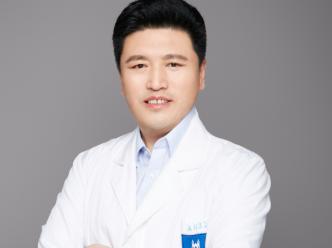 顾建成
